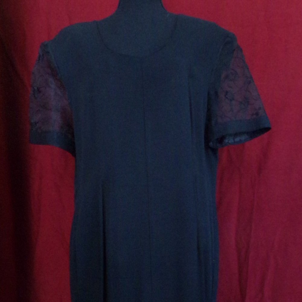 Black slit front dress.